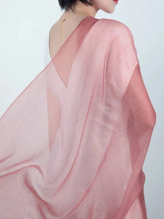 100% Ring Cashmere ultra-thin silky shawl in serene color, lightweight and soft, draped over shoulder.