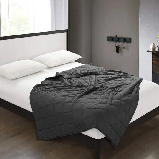 20 lbs soft weighted blanket on a queen bed for relaxation and better sleep.