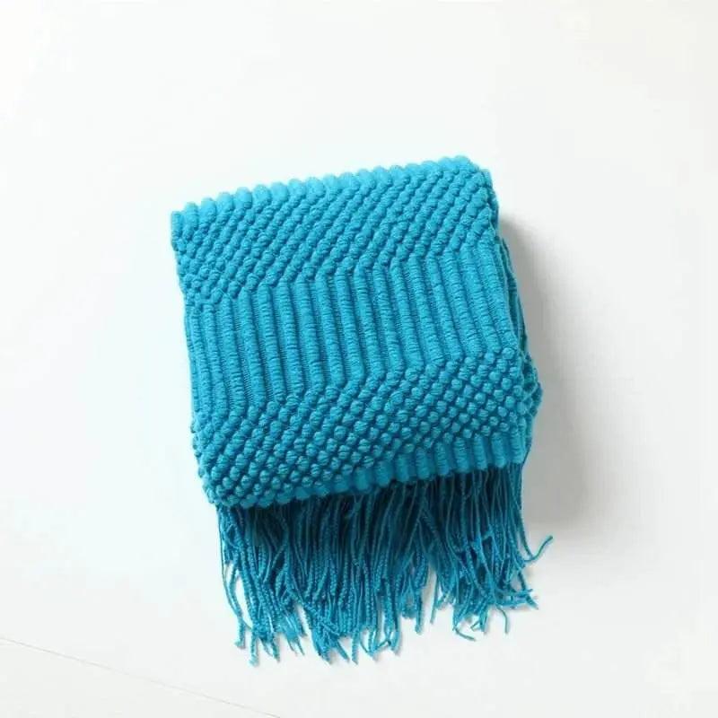 Knitted soft throw blanket with tassels in turquoise, available in 10 colors, hypoallergenic acrylic.
