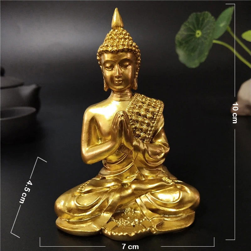 Thai Buddha statue in gold finish, seated with Anjali Mudra, symbolizing serenity and spiritual enlightenment. Ideal for meditation spaces.