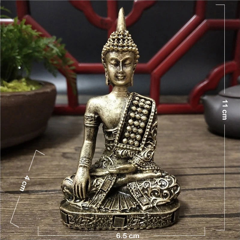 Gold bronze seated Thai Buddha statue with intricate details, embodying spiritual elegance and serenity in traditional mudra gesture.