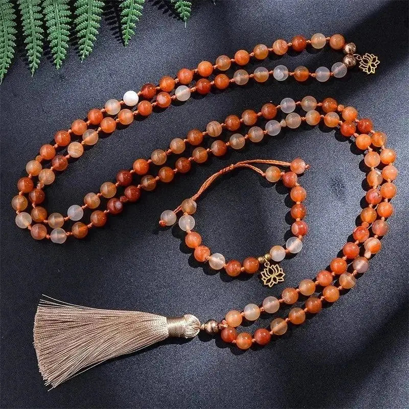 Carnelian Mala with Golden Lotus – 108 Knotted Beads for Strength & Vitality - Serenevi