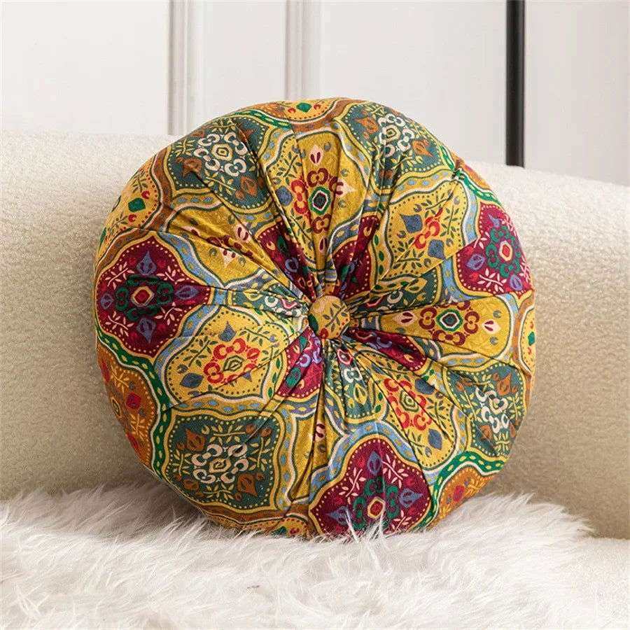 Handmade Boho Round Thick Floor Cushion with colorful patterns and central button design on a white surface.