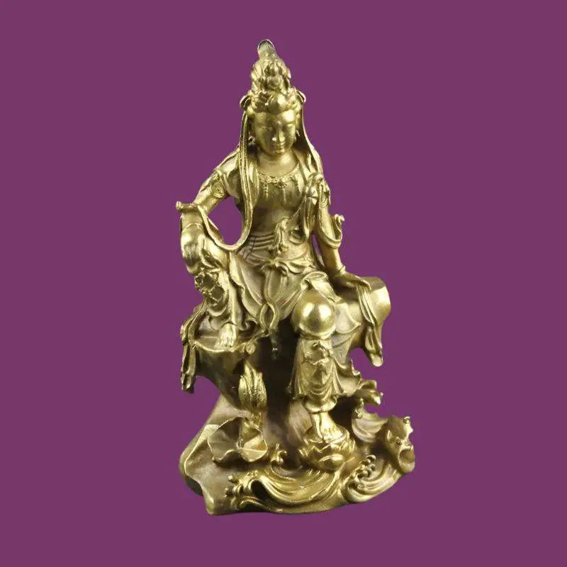 Kwan Yin Figurine in pure copper on a purple background, symbolizing compassion and serenity.