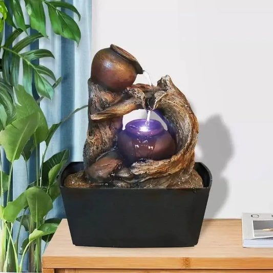 Nature wood branch fountain with unique wooden barrel design, compact indoor tabletop decor.