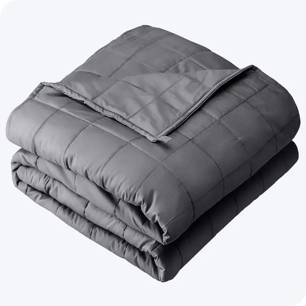 Dark grey king-size weighted blanket, 30 lbs, made from breathable cotton with reinforced stitching, folded neatly.