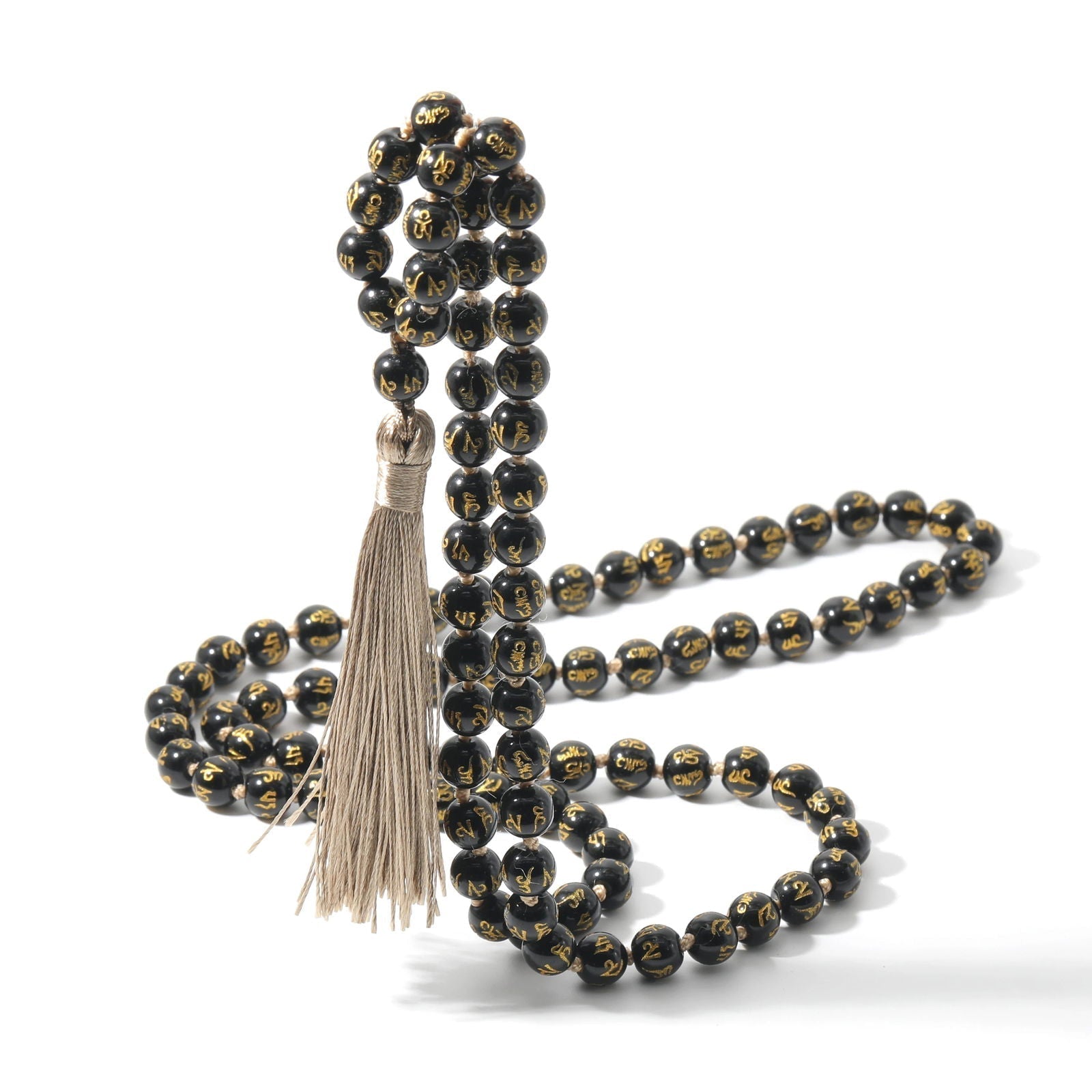 Black Onyx Mala, knotted with "Om Mani Padme Hum" Mantra engraved on each bead. - Serenity Factory