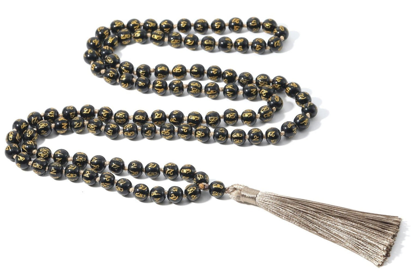 Black Onyx Mala, knotted with "Om Mani Padme Hum" Mantra engraved on each bead. - Serenity Factory